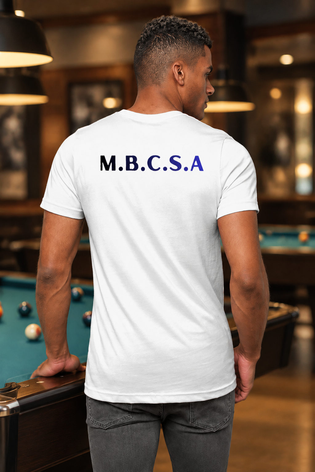 Back model shot of the white M.B.C.S.A T-shirt