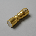 Gold tip tool on grey baize