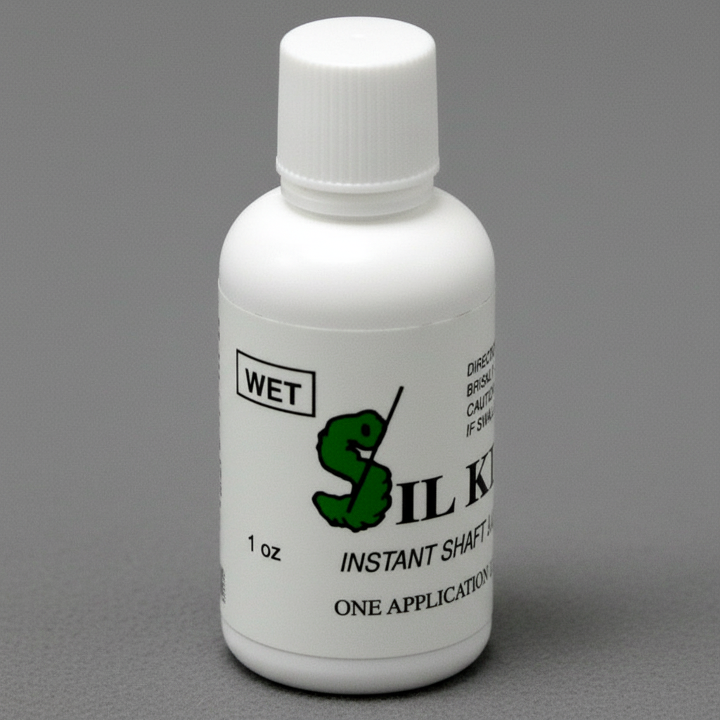 SIL KLEEN shaft and ferrule cleaner bottle on grey pool table cloth