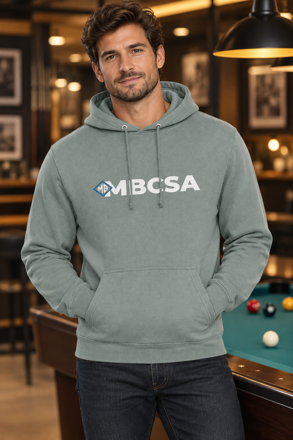 Model wearing the grey-green MBCSA hoodie