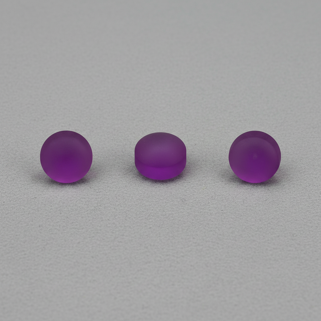Purple crystal tips on grey baize